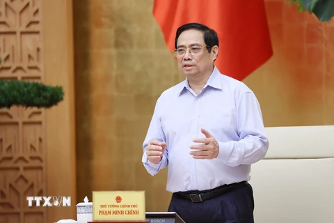 Thủ tướng Phạm Minh Chính chủ trì cuộc họp trực tuyến với lãnh đạo Thành phố Hồ Chí Minh. (Ảnh: Dương Giang/TTXVN)