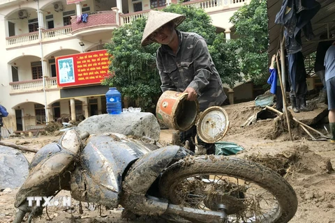 Hình ảnh tỉnh Nghệ An nỗ lực khắc phục hậu quả lũ quét ở Kỳ Sơn