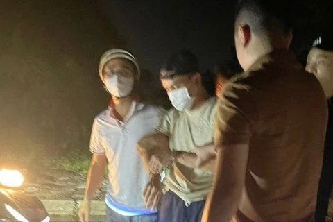 Đối tượng Nguyễn Đức Trung bị bắt giữ. (Ảnh: TTXVN phát) 