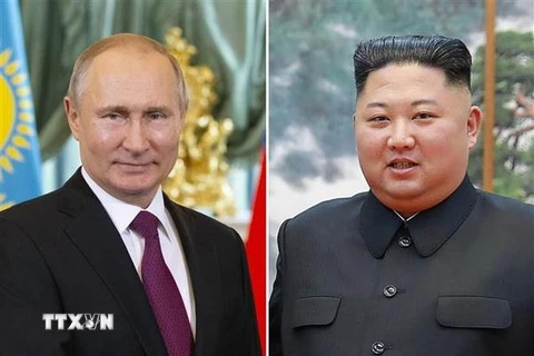 Tổng thống Nga Vladimir Putin (trái) và nhà lãnh đạo Triều Tiên Kim Jong-un. (Nguồn: AFP/TTXVN)