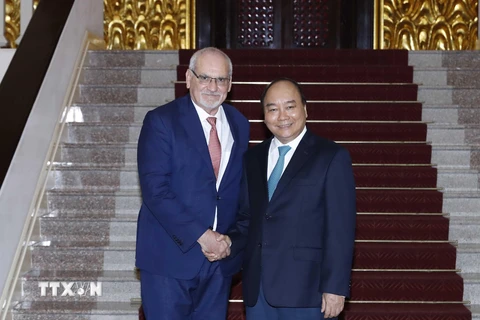 Thủ tướng Nguyễn Xuân Phúc tiếp ông Philippe Le Houérou, Tổng Giám đốc điều hành Tổ chức Tài chính quốc tế (IFC). (Ảnh: Thống Nhất/TTXVN)