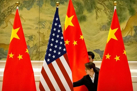 Thỏa thuận thương mại Mỹ-Trung Quốc giai đoạn 1 đã góp phần củng cố niềm tin của giới kinh doanh quốc tế. (Nguồn: Reuters)