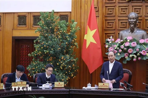 Thủ tướng Nguyễn Xuân Phúc chủ trì cuộc họp. (Ảnh: Thống Nhất/TTXVN)