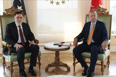 Tổng thống Thổ Nhĩ Kỳ Recep Tayyip Erdogan (phải) và Thủ tướng GNA Fayez al-Sarraj. (Nguồn: Anadolu)