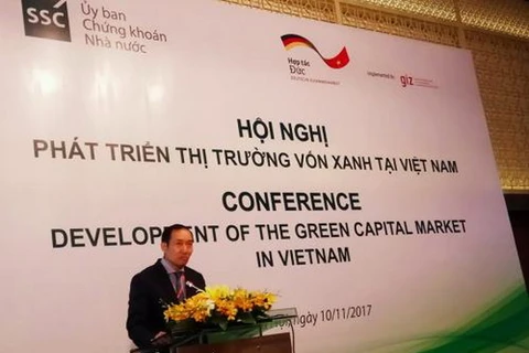Phó Chủ tịch Ủy ban Chứng khoán Nhà nước Phạm Hồng Sơn phát biểu tại hội nghị. (Ảnh: Văn Giáp/BNEWS/TTXVN)
