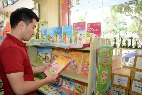 Sách giáo khoa lớp 1 theo chương trình mới sẽ áp dụng từ năm học 2020-2021. (Ảnh: PV/Vietnam+)