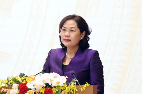 Thống đốc Nguyễn Thị Hồng phát biểu tại hội nghị Chính phủ với địa phương ngày 29/12. (Ảnh: TTXVN)