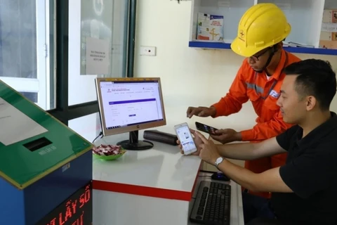 EVN cung cấp dịch vụ điện trực tuyến. (Ảnh: PV/Vietnam+)