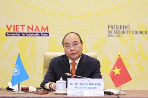 Chủ tịch nước Nguyễn Xuân Phúc tại phiên họp. (Ảnh: Thống Nhất/TTXVN) 