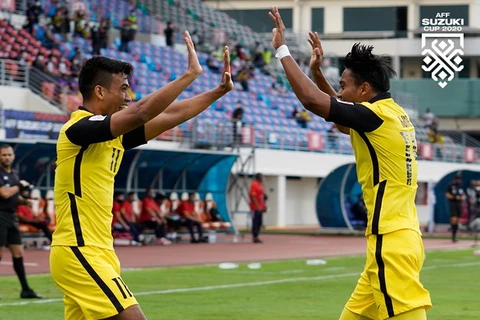 Safawi Rasid (trái) lập cú hat-trick đầu tiên của AFF Cup 2020. (Ảnh: AFF) 