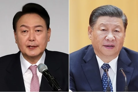 Tổng thống Hàn Quốc Yoon Suk-yeol (trái) và Chủ tịch Trung Quốc Tập Cận Bình. (Nguồn: Yonhap)