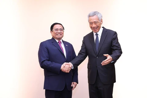 Thủ tướng Phạm Minh Chính gặp Thủ tướng Singapore Lý Hiển Long hồi tháng 5/2022 tại Mỹ. (Ảnh: Dương Giang/TTXVN)