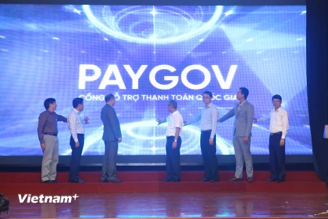 Các trung gian thanh toán đã thực hiện ký kết Thỏa thuận hợp tác với Cục Tin học hóa, Bộ Thông tin và Truyền thông về việc triển khai Cổng thanh toán quốc gia. (Ảnh: PV/Vietnam+)