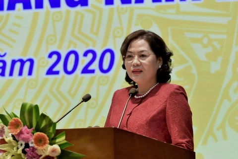 Thống đốc NHNN Nguyễn Thị Hồng phát biểu khai mạc Hội nghị. (Ảnh: CTV/Vietnam+)