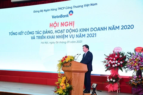 Chủ tịch Hội đồng quản trị VietinBank Lê Đức Thọ phát biểu tại Hội nghị. (Ảnh: Vietnam+)