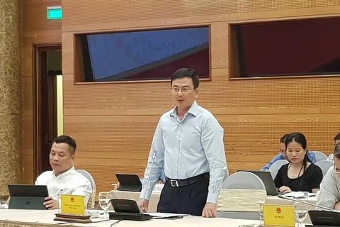 Phó Thống đốc NHNN Phạm Thanh Hà trả lời tại họp báo Chính phủ. (Ảnh: Vietnam+)