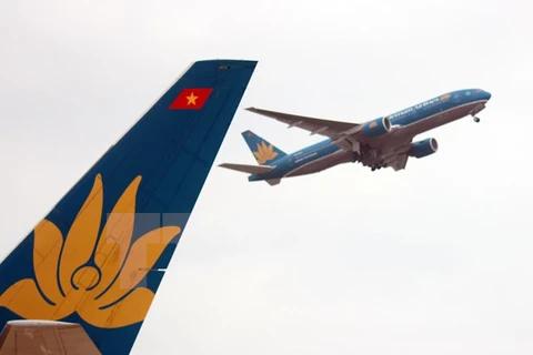 Máy bay của Vietnam Airlines cất cánh tại sân bay quốc tế Nội Bài (Hà Nội). (Ảnh: Huy Hùng/TTXVN)