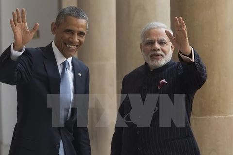 Thủ tướng Ấn Độ Narendra Modi (phải) và Tổng thống Barack Obama (trái) trong cuộc gặp ở New Delhi (Ấn Độ). (Nguồn: AFP/TTXVN)