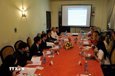 Tổng Viện kiểm sát Cuba và Viện kiểm sát nhân dân tối cao Việt Nam tổ chức Hội thảo Trao đổi kinh nghiệm về một số vấn đề liên quan tới bảo vệ quyền và lợi ích hợp pháp của công dân. (Ảnh: TTXVN) 