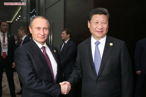 Chủ tịch Trung Quốc Tập Cận Bình gặp Tổng thống Nga Putin tại Antalya, Thổ Nhĩ Kỳ. (Ảnh: THX)