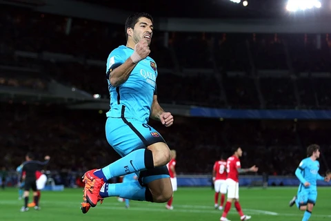 Suarez ăn mừng sau khi ghi ba bàn vào lưới Quảng Châu Evergrande. (Ảnh: Getty Images)