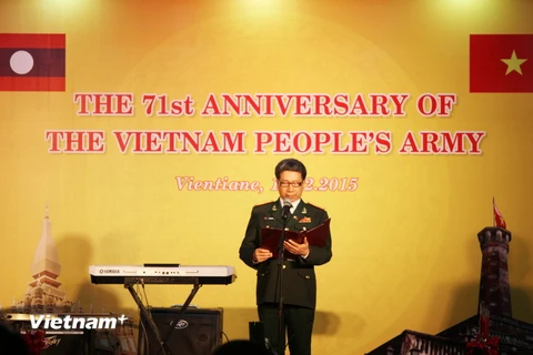 ​Lễ kỷ niệm 71 năm ngày thành lập Quân đội Nhân dân Việt Nam tại Lào. (Ảnh: Phạm Kiên/Vietnam+)