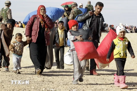 Người tị nạn Syria mắc kẹt tại khu vực biên giới Jordan ngày 14/1. (Ảnh: AFP/TTXVN)