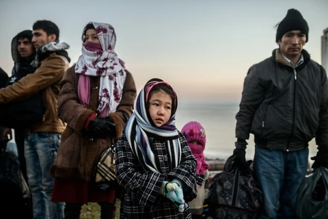 Người di cư Syria chờ để sang Hy Lạp sau khi bị cảnh sát Thổ Nhĩ Kỳ bắt giữ tại Canakkale, Thổ Nhĩ Kỳ ngày 27/1. (Ảnh: AFP/TTXVN)