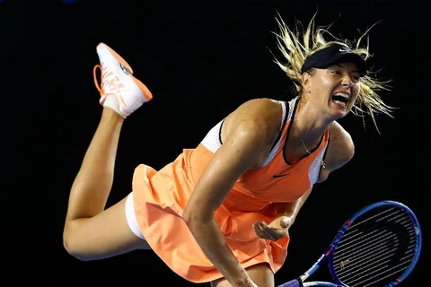Sharapova vẫn chưa thể đánh bại Serena sau 12 năm trời. (Nguồn: Getty Images)