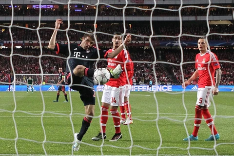 Mueller góp công giúp Bayern vào bán kết. (Nguồn: Getty Images)