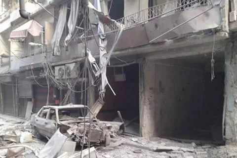 Cảnh tượng hoang tàn ở Aleppo sau các cuộc pháo kích. (Nguồn: asbarez.com)