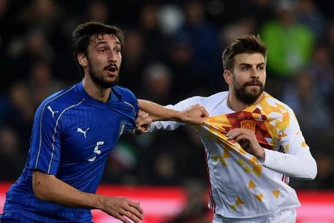 Tâm điểm vòng 1/8 sẽ là cuộc đối đầu giữa Italy và Tây Ban Nha. (Nguồn: AP)