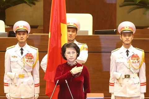 Chủ tịch Quốc hội khóa XIV Nguyễn Thị Kim Ngân tuyên thệ nhậm chức. (Ảnh: Nhan Sáng/TTXVN)