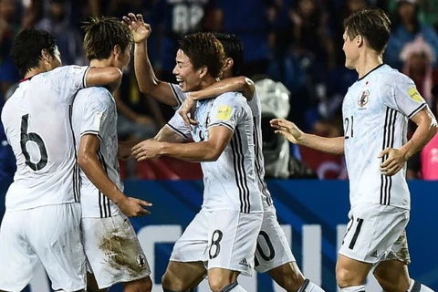 Niềm vui của các cầu thủ Nhật Bản. (Nguồn: AP)