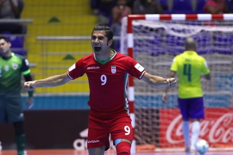 Afshin Kazemi ăn mừng sau khi ghi bàn vào lưới Brazil. (Nguồn: Getty Images)
