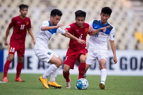 U16 Việt Nam (áo đỏ) vào tứ kết và chỉ cách World Cup đúng 1 trận đấu. (Nguồn: AFC)