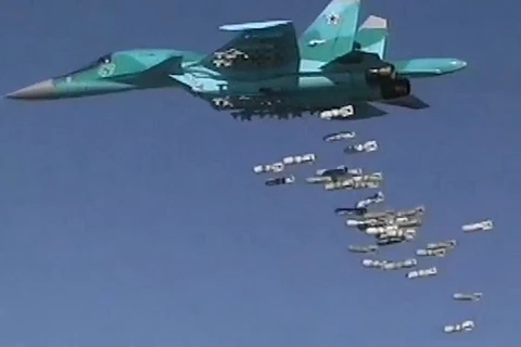 Máy bay chiến đấu của Nga thả bom. (Nguồn: Sputnik)
