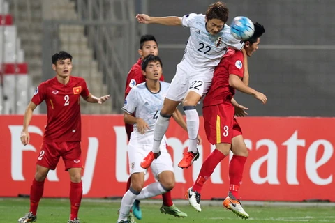 U19 Việt Nam (áo đỏ) dừng bước sau trận thua U19 Nhật Bản. (Nguồn: AFC)