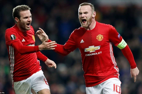 Rooney và Mata cùng ghi bàn giúp Manchester United giành chiến thắng. (Nguồn: PA)