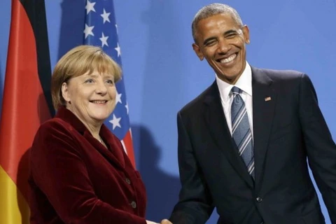 Thủ tướng Đức Merkel và Tổng thống Mỹ Obama. (Nguồn: AP)