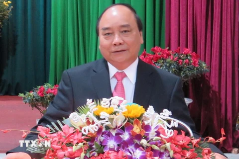 Thủ tướng Nguyễn Xuân Phúc đến thăm, chúc Tết Đảng bộ, chính quyền, nhân dân và các lực lượng vũ trang thành phố Đà Nẵng. (Ảnh: Văn Sơn/TTXVN)