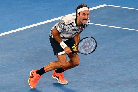 Federer vỡ òa sung sướng khi giành chiến thắng. (Nguồn: Reuters)