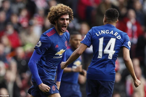 Marouane Fellaini và Jesse Lingard cùng lập công mang chiến thắng về cho Manchester United. (Nguồn: Reuters)
