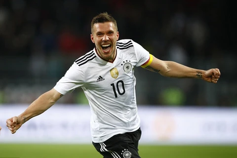 Podolski ăn mừng sau khi ghi bàn thắng cuối cùng cho đội tuyển Đức. (Nguồn: Reuters)