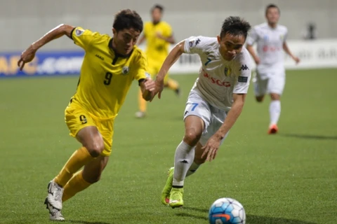 Hà Nội FC (áo trắng) thắng ấn tượng tại Singapore. (Nguồn: AFC)