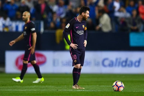 Messi bất lực trước Malaga. (Nguồn: Getty Images)