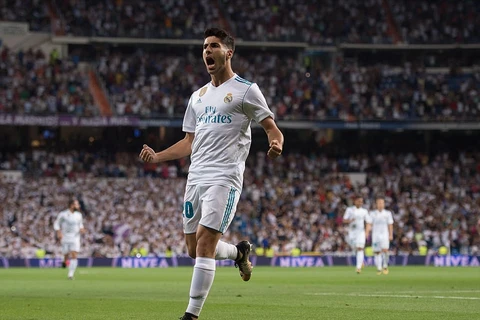 Marco Asensio sắm vai người hùng của Real Madrid. (Nguồn: Getty Images)
