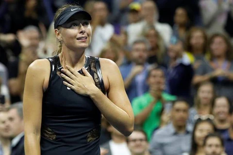Sharapova khóc sau khi giành chiến thắng. (Nguồn: Reuters)