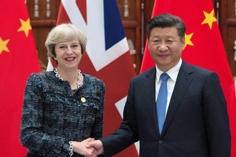 Chủ tịch Trung Quốc Tập Cận Bình và Thủ tướng Anh Theresa May. (Nguồn: PA)