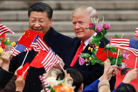 Chủ tịch Trung Quốc Tập Cận Bình đón tiếp Tổng thống Mỹ Trump. (Nguồn: Reuters)